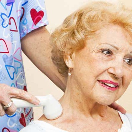 senior woman getting ultrasound treatment