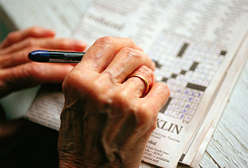 Senior woman doing a crossword