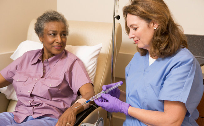 senior woman getting chemotherapy