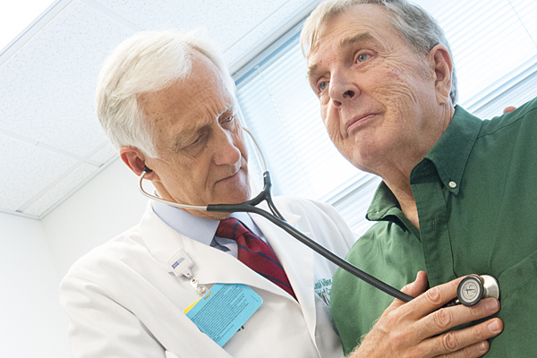 Senior getting heart health check up